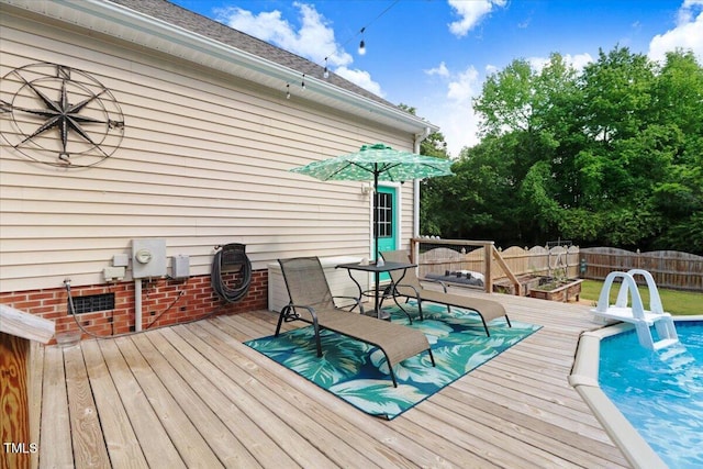 208 N Woodbridge Dr, Pikeville, NC 27863 - view of wooden deck