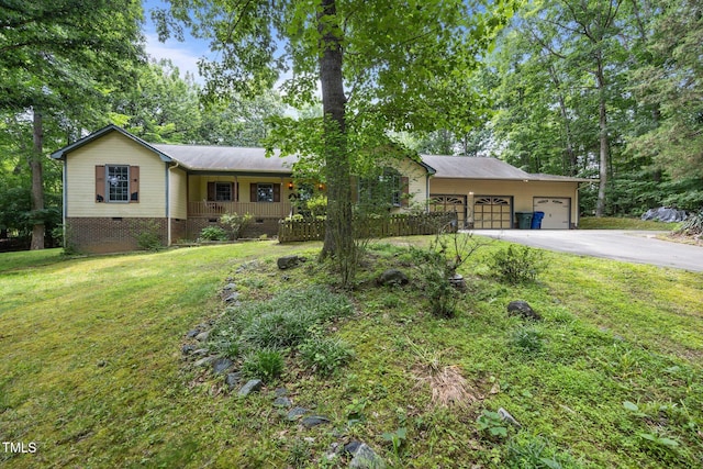 2382 Council Rd, Graham, NC 27253 - view of front of house with crawl space, driveway, a front yard, a garage, and covered porch