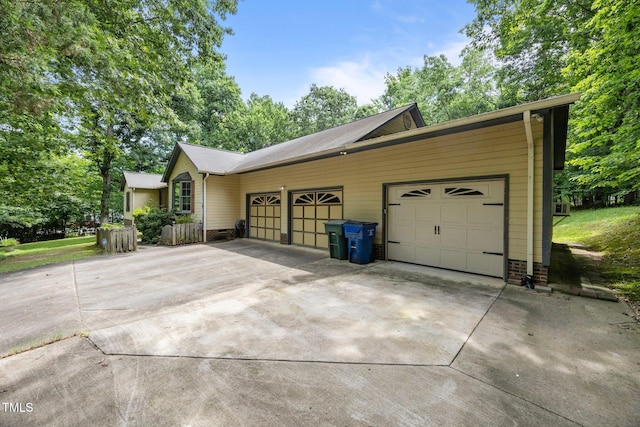 2382 Council Rd, Graham, NC 27253 - view of side of home featuring concrete driveway and an attached garage