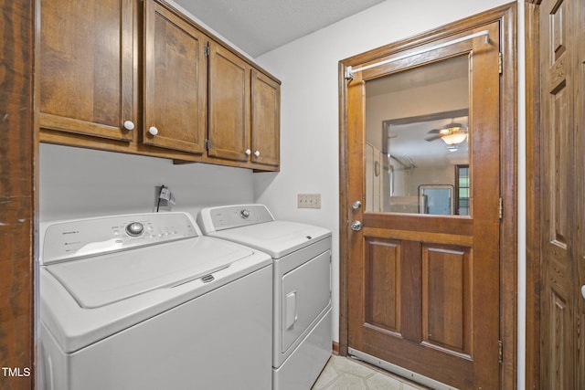 2382 Council Rd, Graham, NC 27253 - laundry room featuring washing machine and clothes dryer and cabinet space