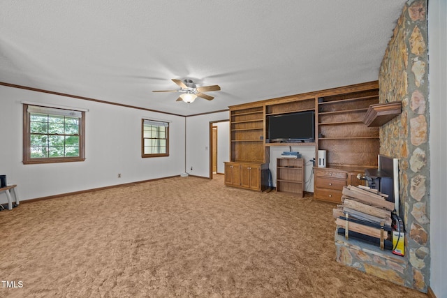 2382 Council Rd, Graham, NC 27253 - unfurnished living room with a ceiling fan, carpet floors, crown molding, and a textured ceiling