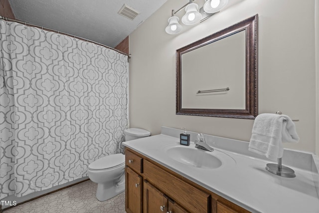 2382 Council Rd, Graham, NC 27253 - full bath featuring vanity, a textured ceiling, and a shower with curtain