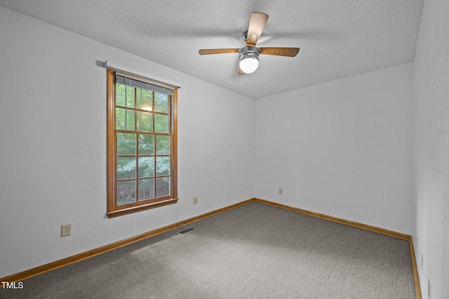 2382 Council Rd, Graham, NC 27253 - empty room with carpet, ceiling fan, and a textured ceiling