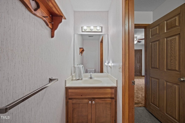 2382 Council Rd, Graham, NC 27253 - half bath featuring vanity and a ceiling fan