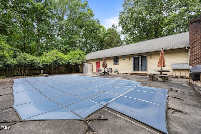 2382 Council Rd, Graham, NC 27253 - view of swimming pool featuring a patio, a grill, and a diving board