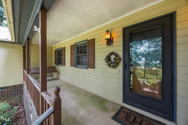 2382 Council Rd, Graham, NC 27253 - view of exterior entry featuring a porch