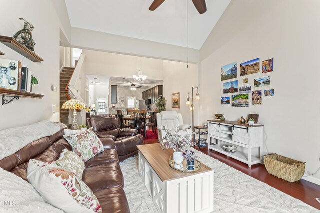 100 Beaconwood Ln, Holly Springs, NC 27540 - living area featuring a ceiling fan, stairs, high vaulted ceiling, and wood finished floors