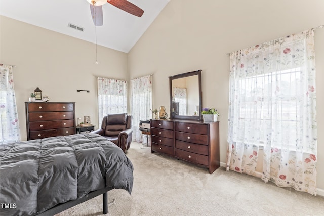 100 Beaconwood Ln, Holly Springs, NC 27540 - bedroom featuring multiple windows, light carpet, high vaulted ceiling, and ceiling fan