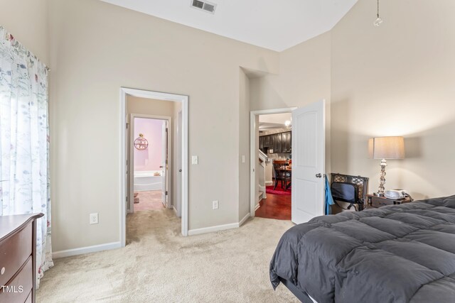 100 Beaconwood Ln, Holly Springs, NC 27540 - bedroom featuring light colored carpet and multiple windows