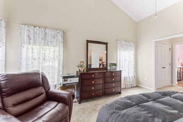 100 Beaconwood Ln, Holly Springs, NC 27540 - bedroom with high vaulted ceiling, multiple windows, and light colored carpet