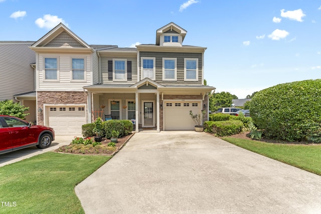 100 Beaconwood Ln, Holly Springs, NC 27540 - view of front of house with driveway, a garage, a front yard, and covered porch