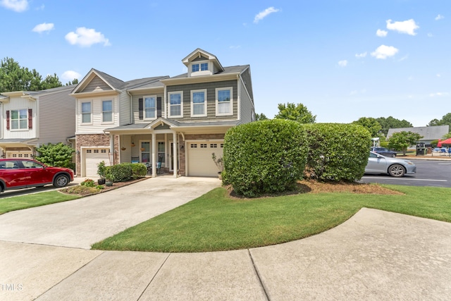 100 Beaconwood Ln, Holly Springs, NC 27540 - view of front facade with an attached garage, a front lawn, and concrete driveway