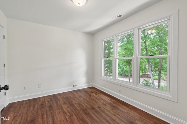 3 White Ash Dr, Durham, NC 27712 - unfurnished room with baseboards and dark wood-style flooring