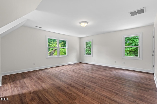 3 White Ash Dr, Durham, NC 27712 - unfurnished room with dark wood-style floors and lofted ceiling
