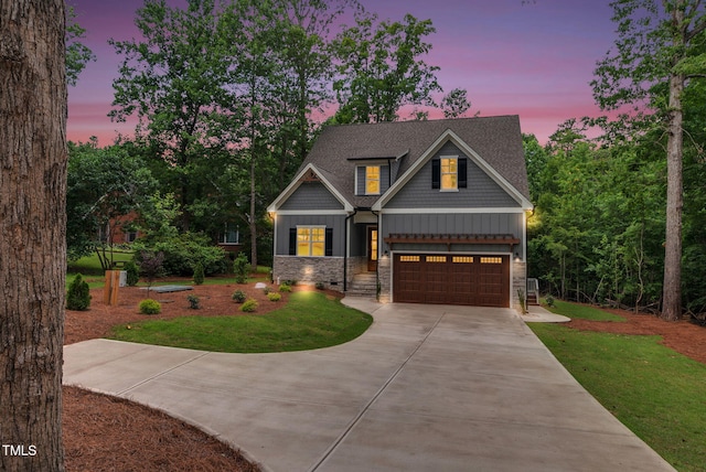 5504 Earle Rd, Raleigh, NC 27606 - craftsman house featuring stone siding, driveway, a yard, and a garage