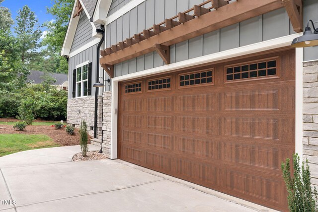 5504 Earle Rd, Raleigh, NC 27606 - garage featuring concrete driveway