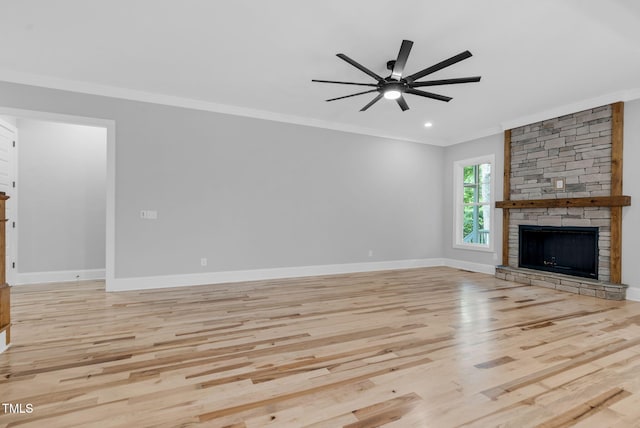 5504 Earle Rd, Raleigh, NC 27606 - unfurnished living room with ornamental molding, wood finished floors, a ceiling fan, a fireplace, and recessed lighting