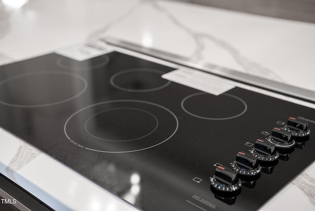 5504 Earle Rd, Raleigh, NC 27606 - detailed view of black electric cooktop