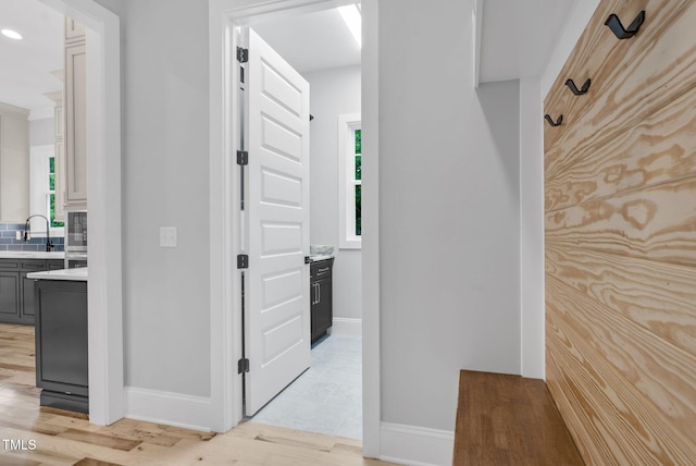 5504 Earle Rd, Raleigh, NC 27606 - hall with light wood finished floors and recessed lighting