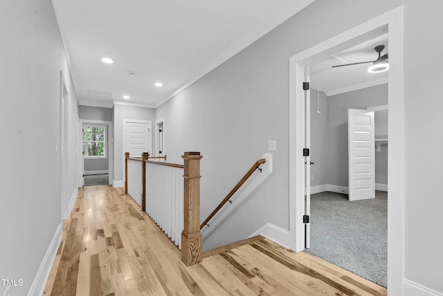 5504 Earle Rd, Raleigh, NC 27606 - corridor featuring an upstairs landing, ornamental molding, light wood-style floors, and recessed lighting