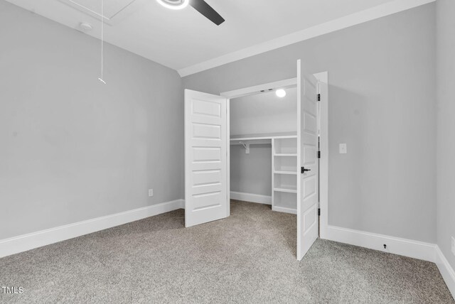 5504 Earle Rd, Raleigh, NC 27606 - unfurnished bedroom featuring attic access, carpet flooring, a closet, and a ceiling fan