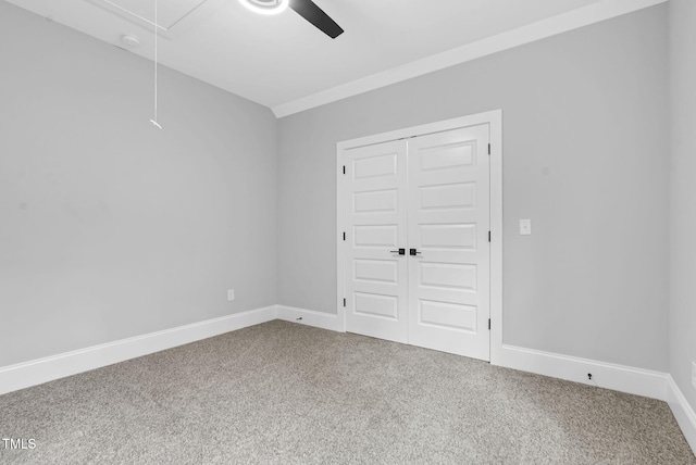 5504 Earle Rd, Raleigh, NC 27606 - unfurnished bedroom with attic access, carpet flooring, a closet, and ceiling fan