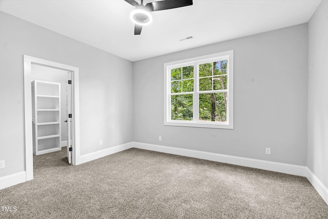 5504 Earle Rd, Raleigh, NC 27606 - carpeted spare room featuring ceiling fan and baseboards