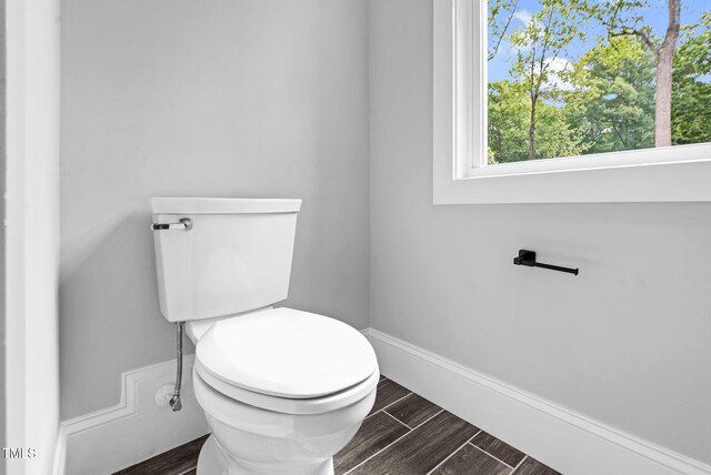5504 Earle Rd, Raleigh, NC 27606 - bathroom with toilet and baseboards