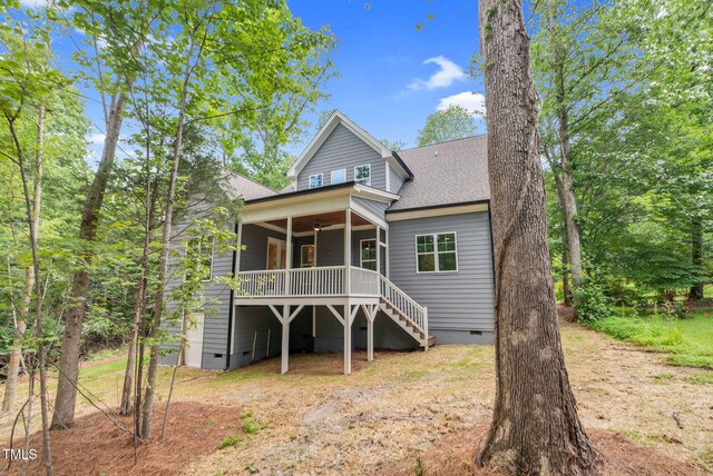 5504 Earle Rd, Raleigh, NC 27606 - view of front of house featuring crawl space, stairs, a ceiling fan, a deck, and a shingled roof