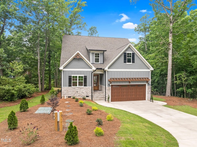 5504 Earle Rd, Raleigh, NC 27606 - craftsman-style home featuring stone siding, driveway, roof with shingles, a garage, and board and batten siding