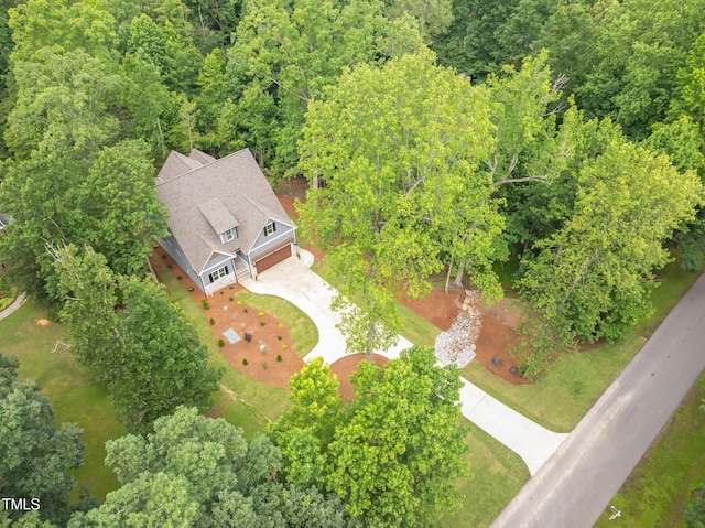5504 Earle Rd, Raleigh, NC 27606 - aerial view of property and surrounding area with a forest