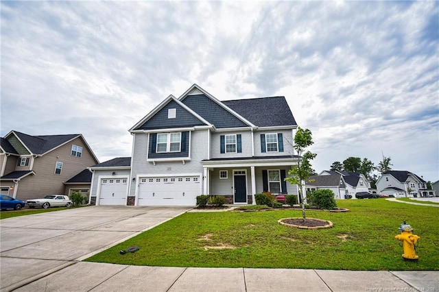 129 Stonebriar Ave, Raeford, NC 28376 - craftsman house featuring concrete driveway, covered porch, a front lawn, a garage, and a residential view