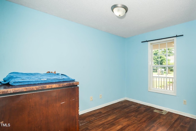 612 Agin Court Pl, Clayton, NC 27520 - bedroom featuring dark wood-type flooring and baseboards
