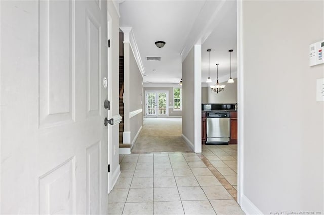 427 Georgetown Cir, Fayetteville, NC 28314 - entrance foyer with baseboards, light tile patterned flooring, and crown molding