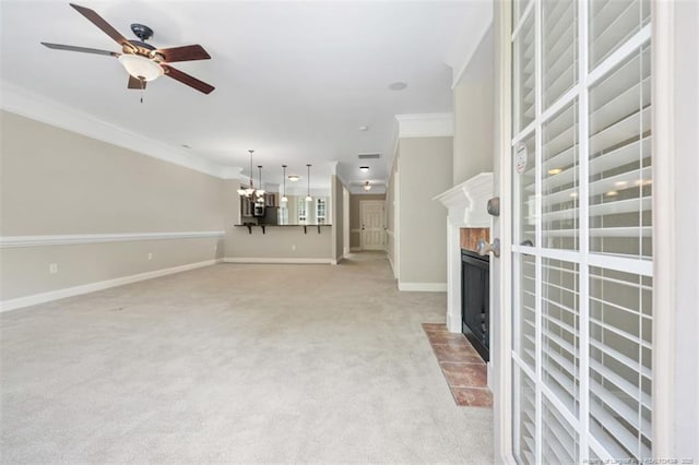 427 Georgetown Cir, Fayetteville, NC 28314 - unfurnished living room with ornamental molding, a fireplace with flush hearth, light carpet, ceiling fan, and baseboards