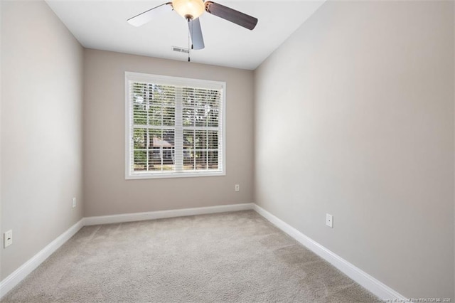 427 Georgetown Cir, Fayetteville, NC 28314 - carpeted empty room with a ceiling fan and baseboards