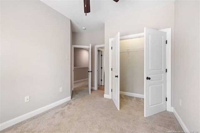 427 Georgetown Cir, Fayetteville, NC 28314 - unfurnished bedroom featuring light carpet, baseboards, a closet, and ceiling fan