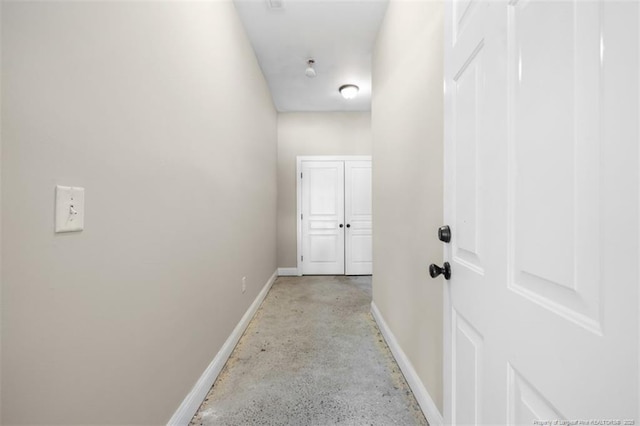 427 Georgetown Cir, Fayetteville, NC 28314 - corridor featuring baseboards and concrete flooring