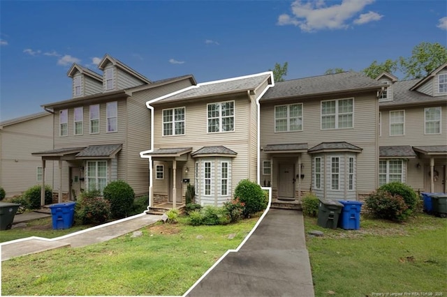 427 Georgetown Cir, Fayetteville, NC 28314 - townhome / multi-family property with a front yard