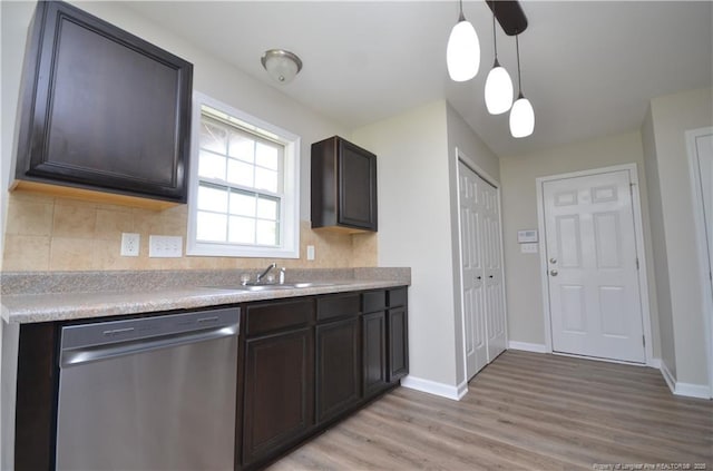 479 Broad Dr, Raeford, NC 28376 - kitchen with dishwasher, a sink, light wood-type flooring, and baseboards