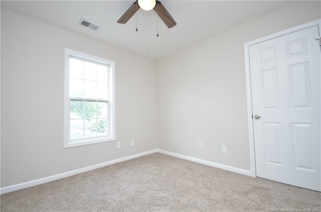 479 Broad Dr, Raeford, NC 28376 - unfurnished room featuring carpet, a ceiling fan, and baseboards