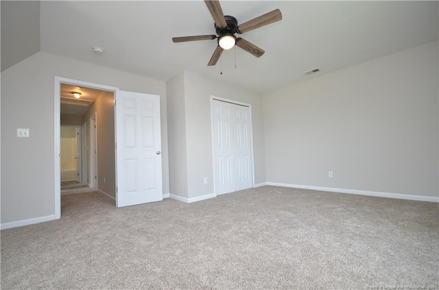 479 Broad Dr, Raeford, NC 28376 - unfurnished bedroom featuring carpet floors, a closet, baseboards, and a ceiling fan