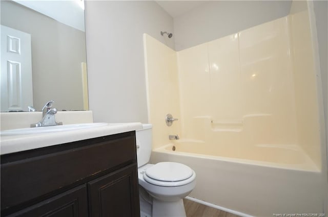 479 Broad Dr, Raeford, NC 28376 - full bath featuring toilet, vanity,  shower combination, and wood finished floors