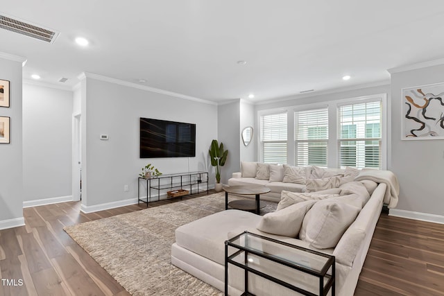 8415 Zinc Autumn Path, Raleigh, NC 27615 - living area featuring wood finished floors, ornamental molding, baseboards, and recessed lighting
