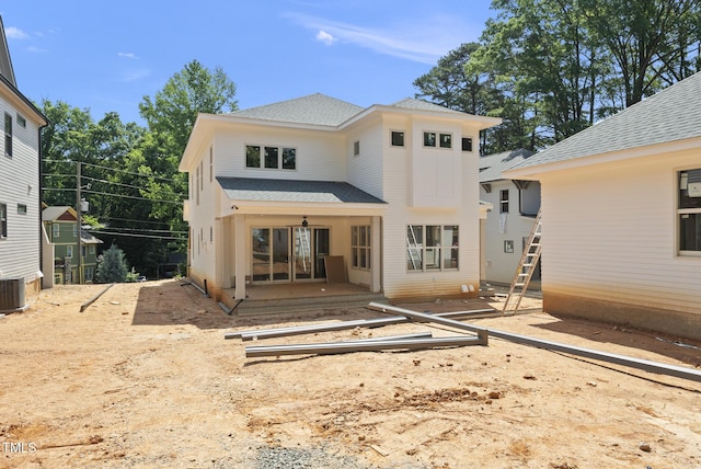 1225 Dixie Trl, Raleigh, NC 27607 - back of property featuring a shingled roof and french doors