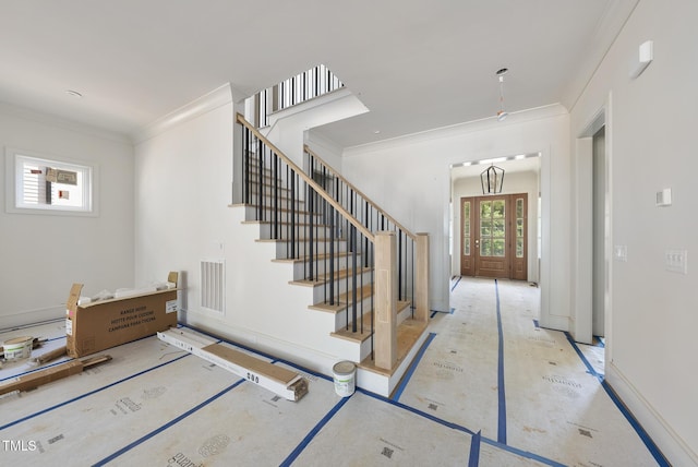 1225 Dixie Trl, Raleigh, NC 27607 - staircase with crown molding