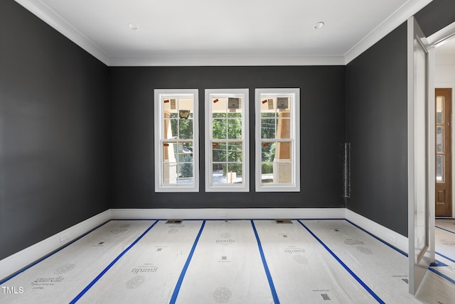 1225 Dixie Trl, Raleigh, NC 27607 - spare room with baseboards and ornamental molding