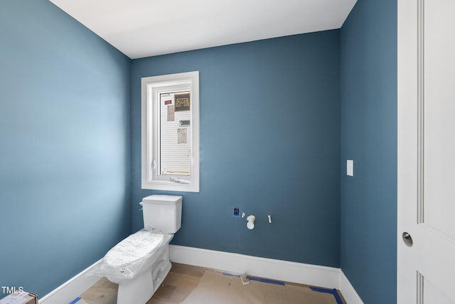 1225 Dixie Trl, Raleigh, NC 27607 - bathroom with baseboards and wood finished floors