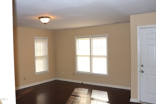 2204 Caroline Dr, Durham, NC 27705 - empty room with dark wood finished floors and baseboards