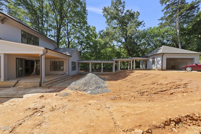 1221 Dixie Trl, Raleigh, NC 27607 - view of yard with a patio and a garage